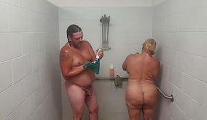 Husband and fit together attracting a shower with a quickie.