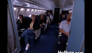 Juli Ashton copulates ginger linn in an airplane